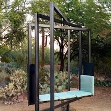 Etazin's curved steel chair with a woven seat